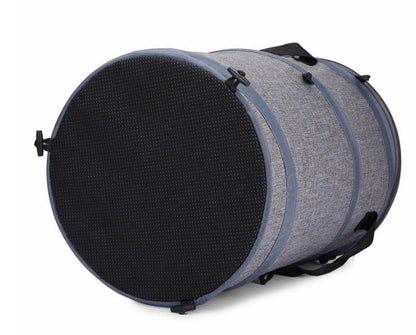 Collapsible pet carrier bag made of durable Oxford cloth, accommodating pets up to 18kg with a unique skylight design and lightweight, foldable construction