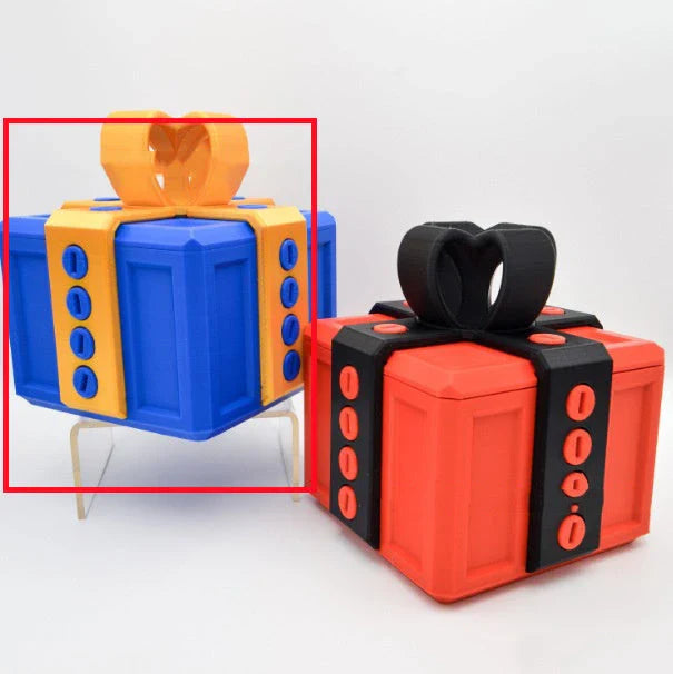 Clever Gag Gift Box - Unique 3D printed design in various colors with a humorous "trouble" concept for prank gifts and creative holiday presents