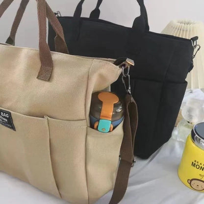 Stylish Spacious Canvas Shoulder Bag for daily commute in khaki, black, beige, and black corduroy style