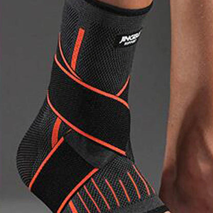 Sports compression ankle protector in black, green, and orange colours
