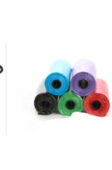 Eco-friendly dog poop bags in various colours for pet waste cleanup