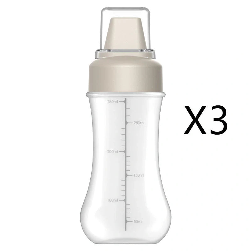 Five-hole scale squeezing sauce bottle with lid for precise kitchen use