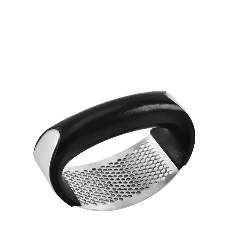 Stainless steel garlic press with ergonomic handle for easy mashing