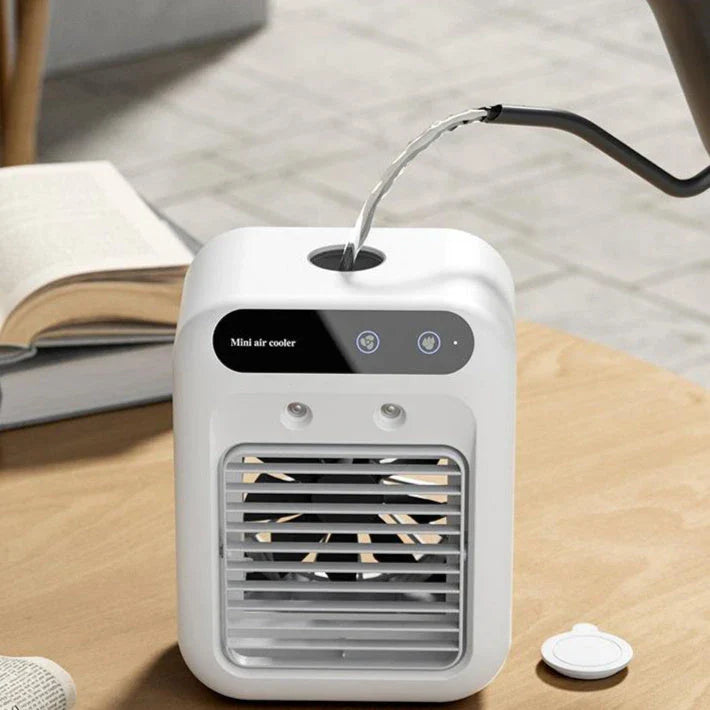 Portable USB-powered air cooler with humidifying function, ideal for home, office, and car use