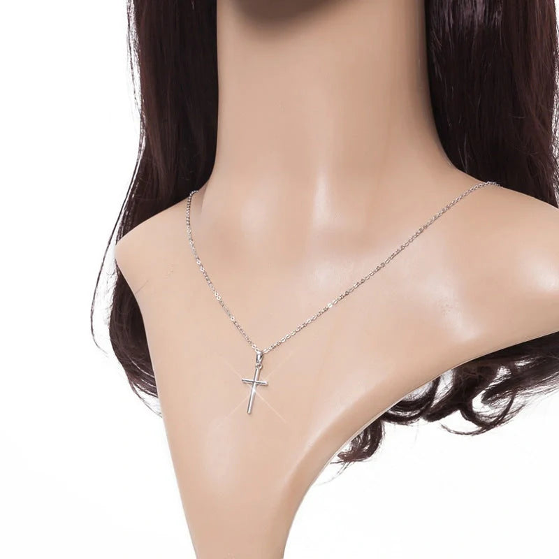 Elegant retro cross pendant made of alloy with a lustrous finish, perfect for British style