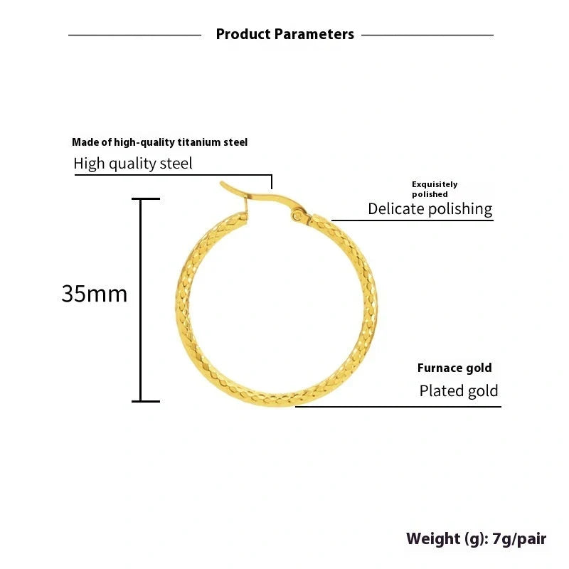 Elegant 18K gold-plated round ring earrings with embossed detail, perfect for any occasion.