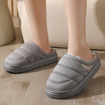 Cozy plush slippers with suede uppers, plush lining, and durable EVA soles for ultimate indoor comfort and warmth