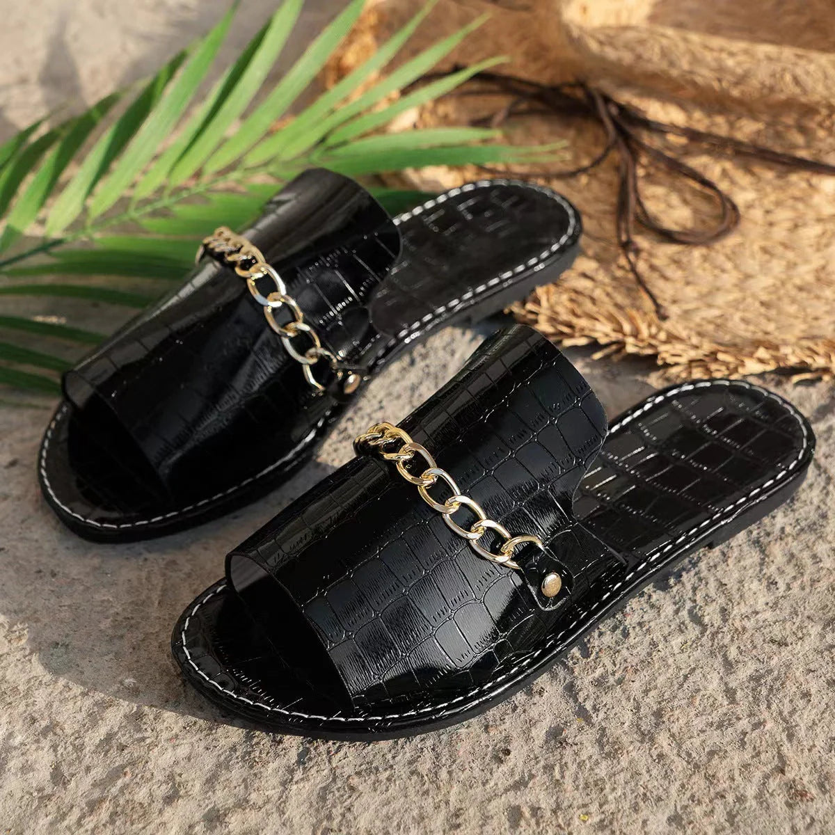 Stylish chain-embellished summer sandals for women featuring a comfortable artificial PU upper and durable rubber soles in a variety of chic colours