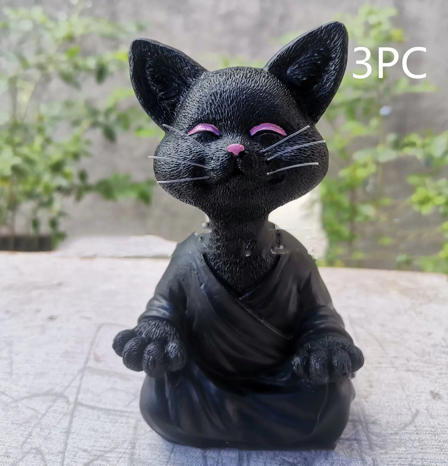 Captivating Black Buddha Cat Figurine crafted from premium resin, perfect for meditation spaces, yoga studios, and home decor