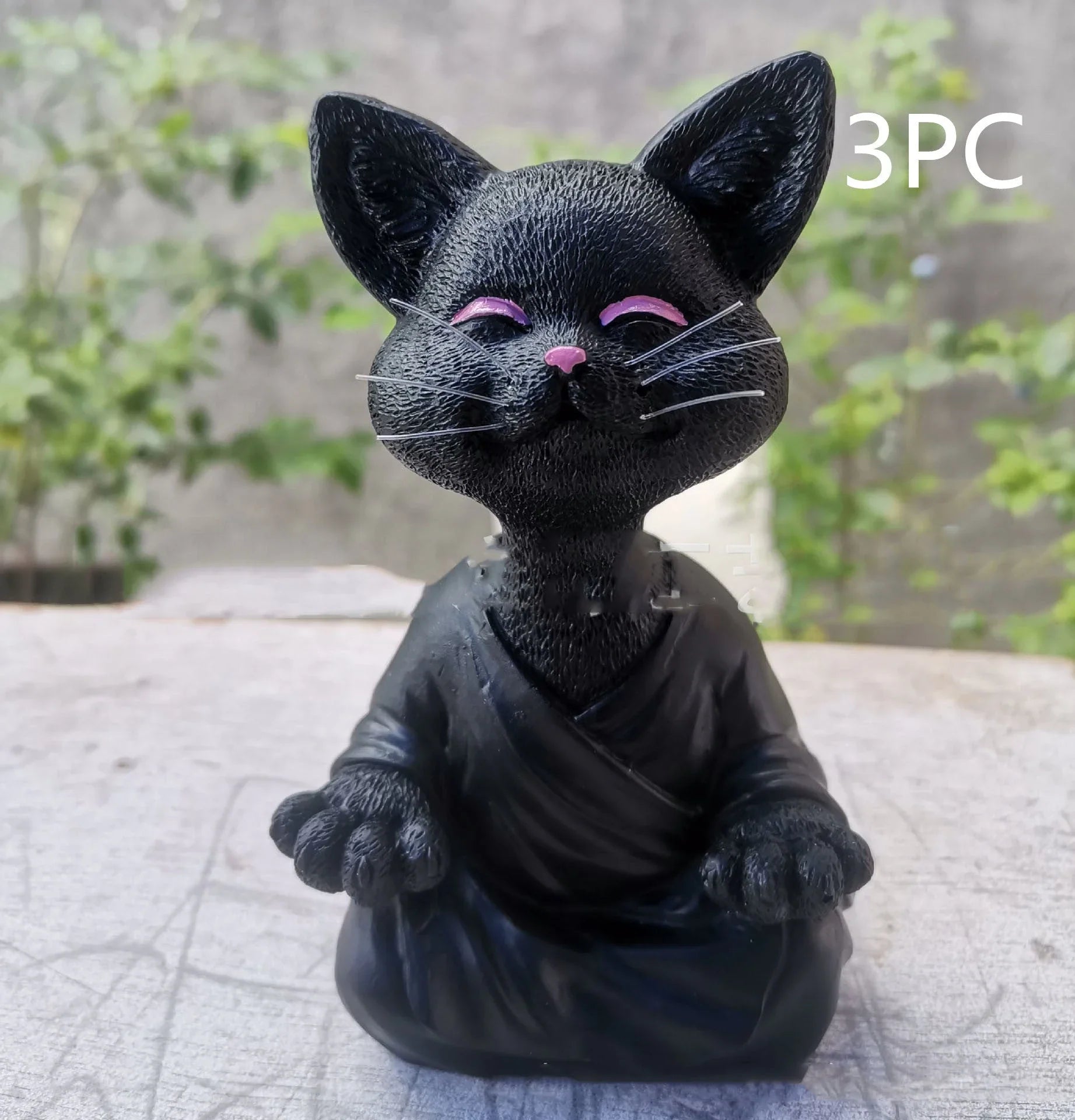 Captivating Black Buddha Cat Figurine crafted from premium resin, perfect for meditation spaces, yoga studios, and home decor
