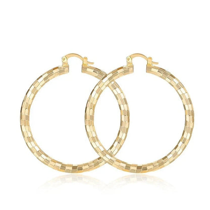 Elegant gold-plated minimalist circular earrings with a sophisticated British design