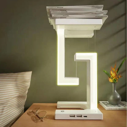 Floating table lamp with wireless charging for smartphones in modern minimalist design