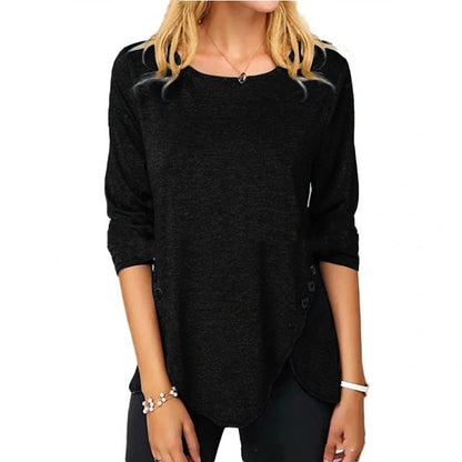 Oversized cotton t-shirt with irregular button hem in black, green, and blue colors