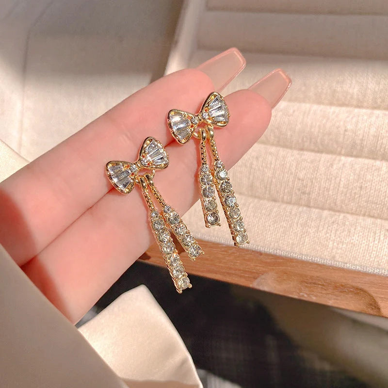 Gold bow diamond crystal earrings for women, fashionable and elegant