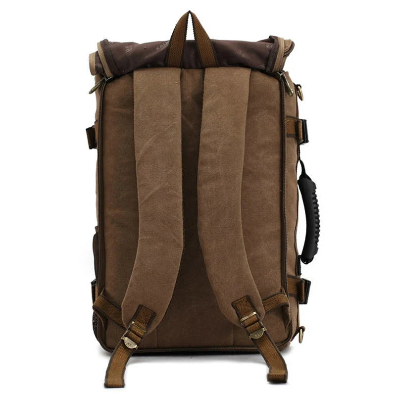 Men's canvas backpack with reinforced handle and multiple pockets