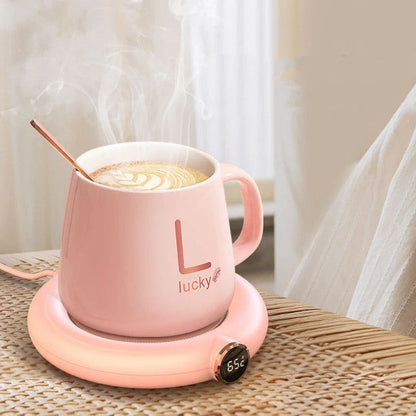Sleek cordless coffee mug warmer keeps hot drinks at perfect temperature for hours