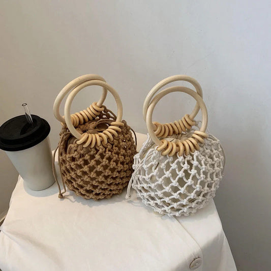 Stylish woven beach bag with wooden handle, perfect for summer outings