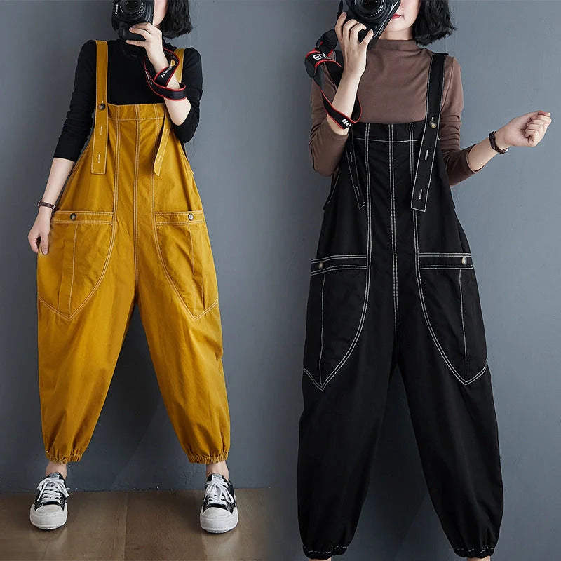 Stylish plus-size black and yellow dungarees in a comfortable, fashionable design for the modern commuter