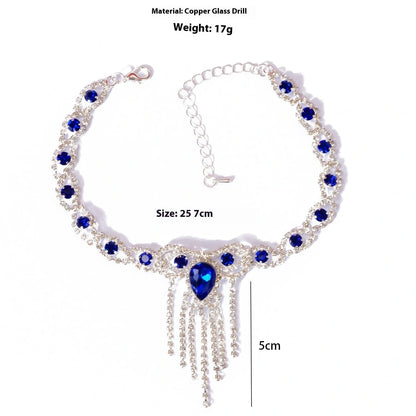 Elegant blue rhinestone tassel anklet for women, perfect for adding glamour to any outfit.