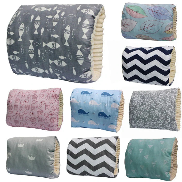 Adjustable baby nursing arm pillow in various colors and patterns, including dark blue, gray, pink, and more. Features soft, breathable cotton fabric and an ergonomic design to support breastfeeding mothers.
