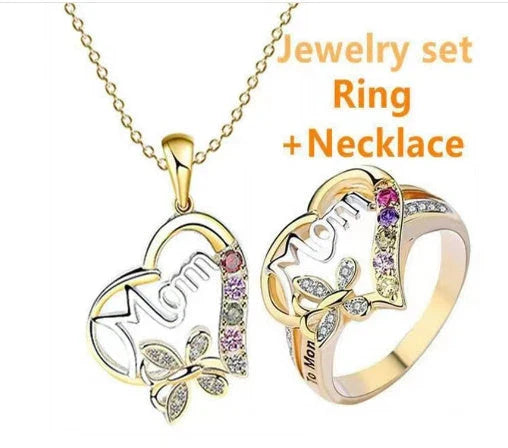 Elegant rhinestone heart-shaped ring in gold color with a dazzling array of multicolored rhinestones