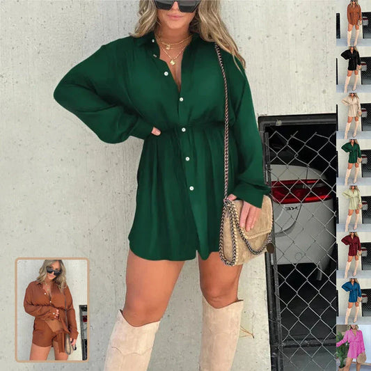 Women's long sleeve jumpsuit with button accents in various vibrant colors