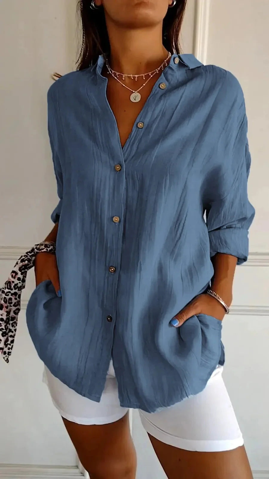 A stylish long-sleeved shirt with a pleated design, available in a variety of colours to suit any occasion.