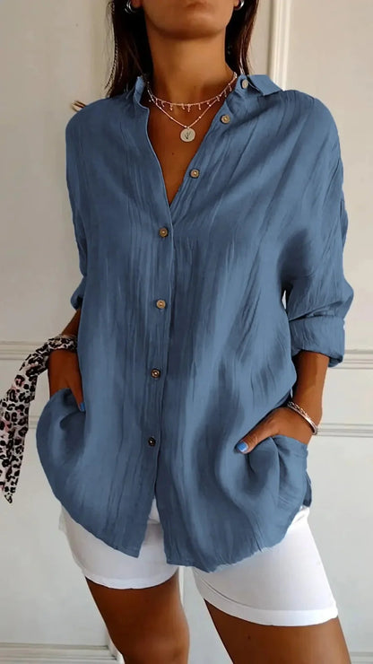 A stylish long-sleeved shirt with a pleated design, available in a variety of colours to suit any occasion.