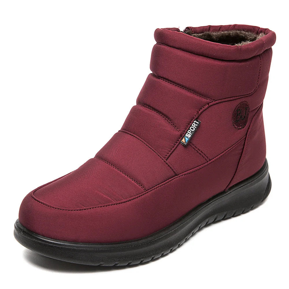 Women's waterproof snow boots in red, black, and brown with non-slip soles
