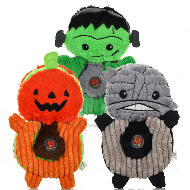 Halloween-themed plush dog toys with squeak features in grey, orange, and green