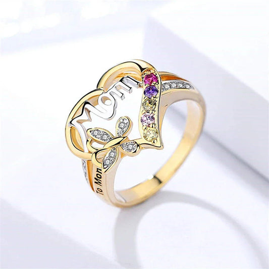 Elegant rhinestone heart-shaped ring in gold color with a dazzling array of multicolored rhinestones