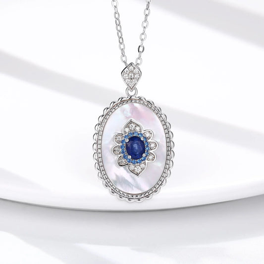 Elegant sterling silver pendant necklace with sparkling sapphires and diamonds, perfect for fashion-forward women