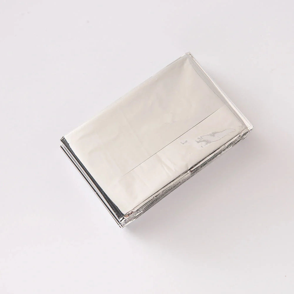 Double-sided silver and gold emergency survival blanket for outdoor use