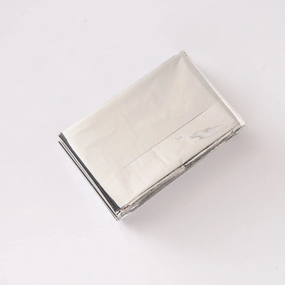 Double-sided silver and gold emergency survival blanket for outdoor use
