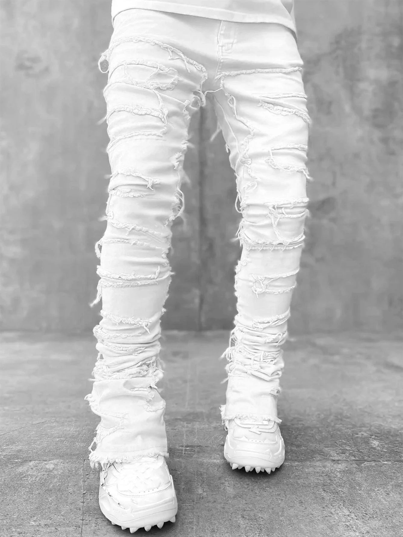 Stylish patched jeans with tight fit and stacked leg design in a variety of fashionable colors