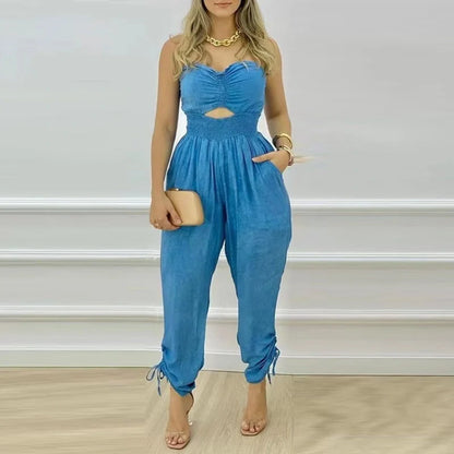 Women's sleeveless denim jumpsuit with tube top design in classic blue