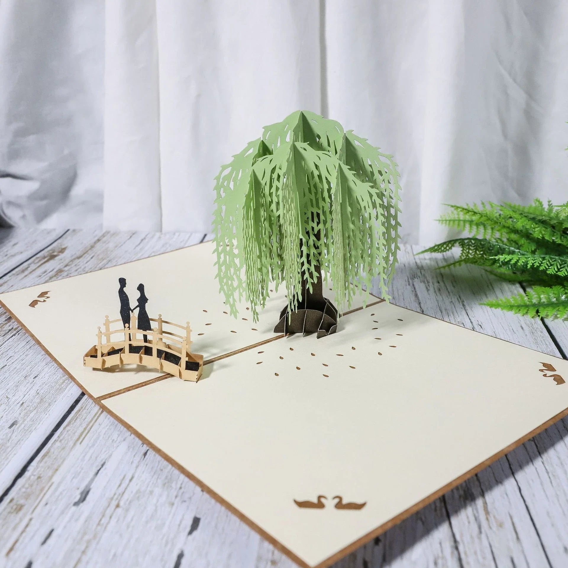 Elegant 3D pop-up wedding and anniversary greeting cards with laser-cut designs in a variety of romantic themes