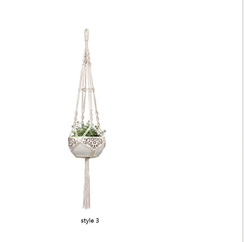 Handmade bohemian macrame hanging plant baskets in a set of four, perfect for home decor.