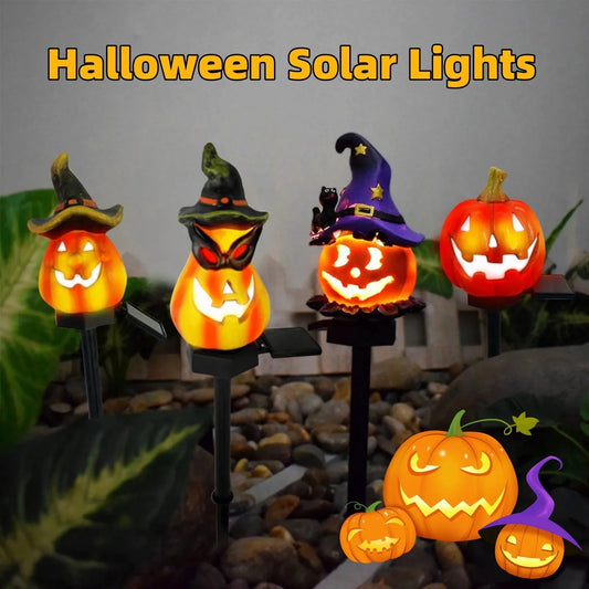 Solar-powered Halloween pumpkin lanterns in garden setting