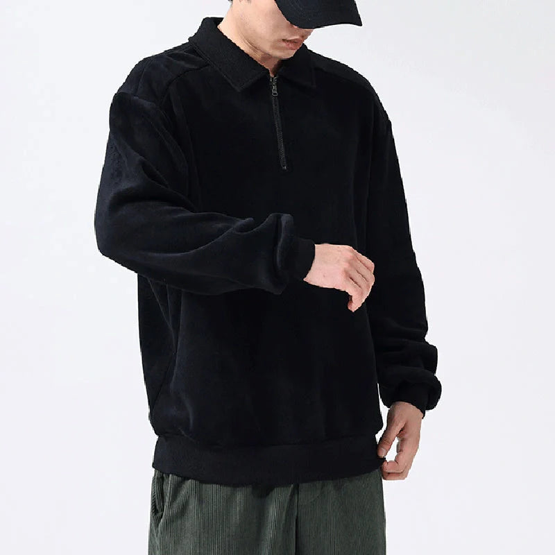 Premium fleece half-zip hoodie in black, haze green, and apricot yellow colours, featuring a tailored design and ribbed details for a refined look.