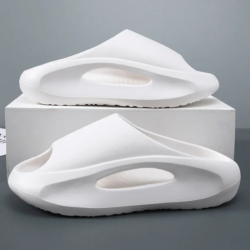 Stylish unisex beach slippers with a unique hollow, ventilated design for maximum breathability and comfort