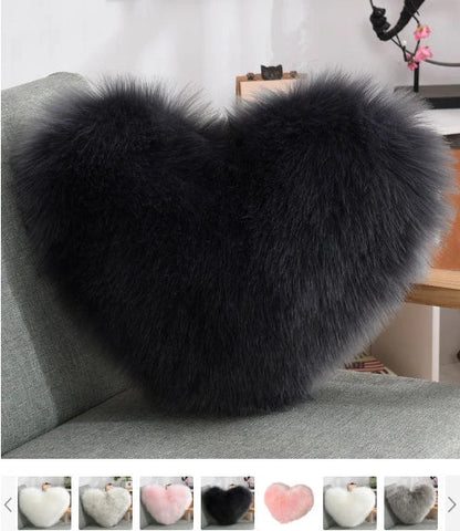 Cozy heart-shaped throw pillow with plush, shaggy texture in various colors