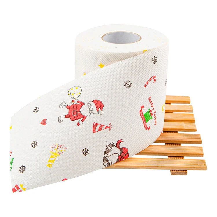 Christmas themed toilet roll with Santa Claus and holiday designs