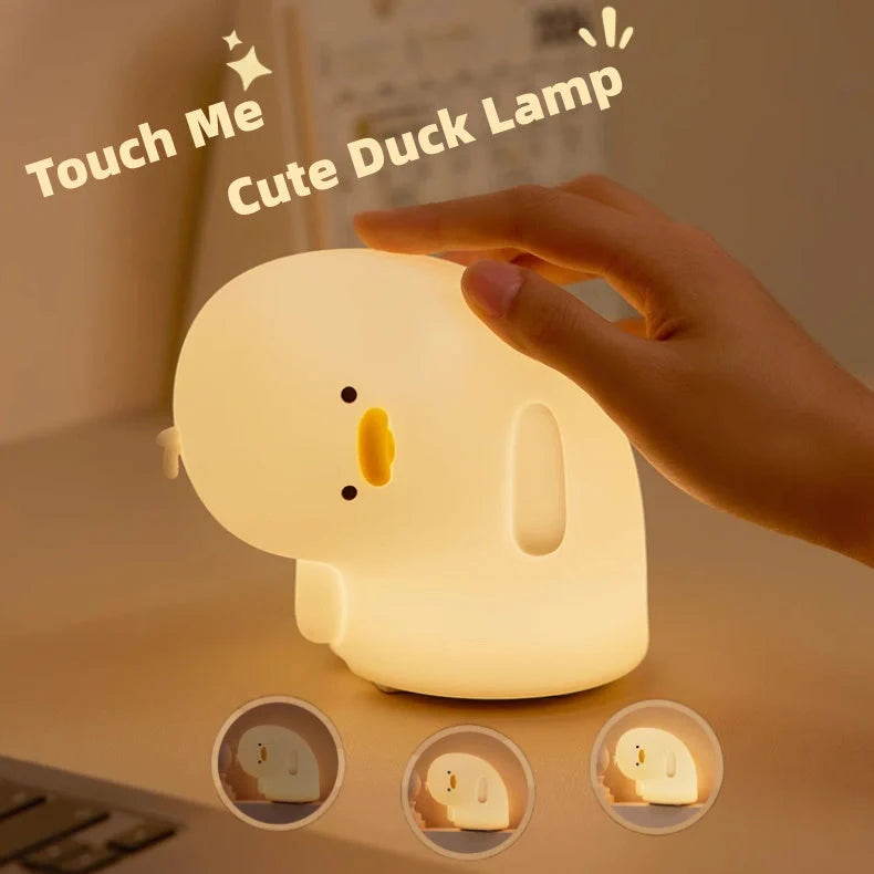 Cute Duck LED Night Light in white and yellow, USB rechargeable with touch control