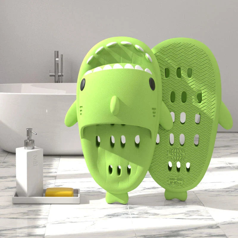 Fashionable shark-themed shower slides with drainage holes, featuring a realistic shark design, quick-drying EVA material, and non-slip traction.