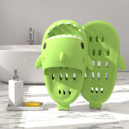 Fashionable shark-themed shower slides with drainage holes, featuring a realistic shark design, quick-drying EVA material, and non-slip traction.