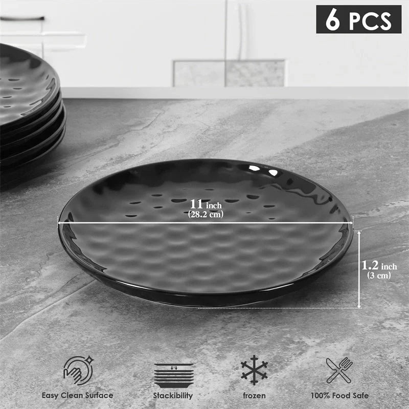 Elegant black ceramic dinner plate set with hammered design, perfect for parties and family dinners