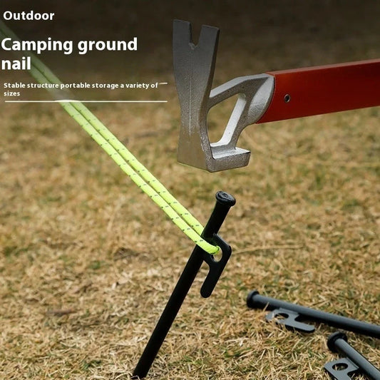 Sturdy black steel camping peg for secure tent pitching, 30cm in length