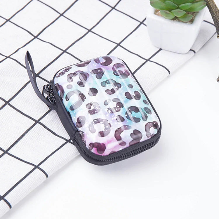 Tinplate coin purse with anime-inspired cartoon graphics, available in various stylish designs