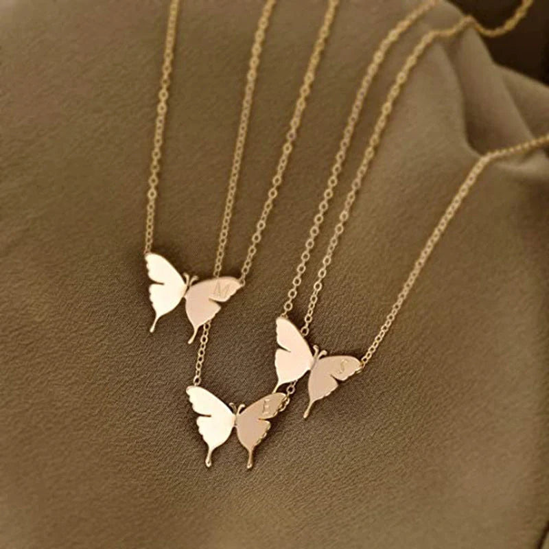 Elegant geometric butterfly pendant necklace in gold, silver, and rose gold